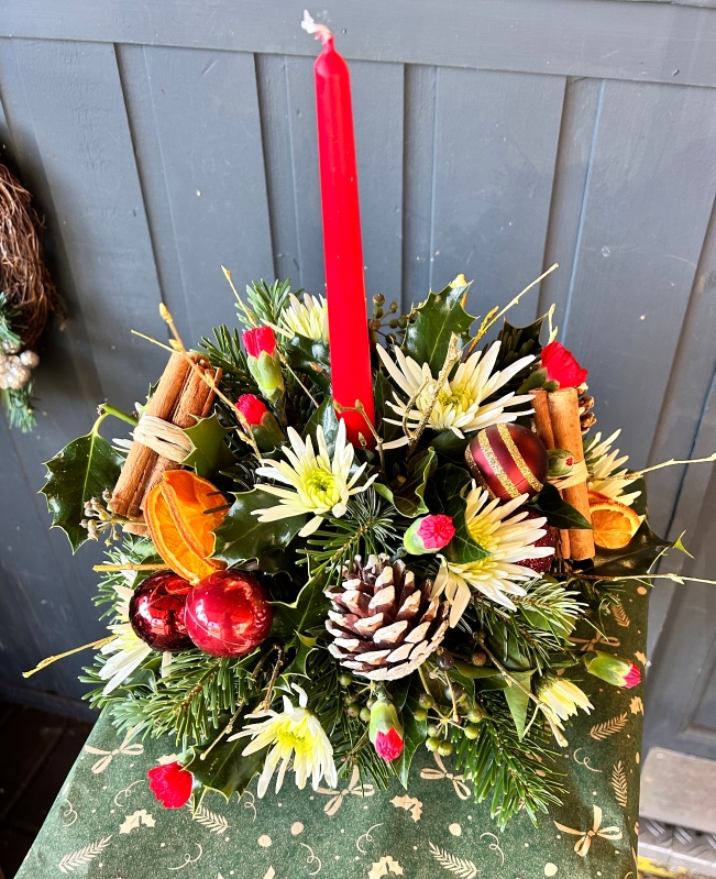 Christmas Round Table Arrangement With Candle
