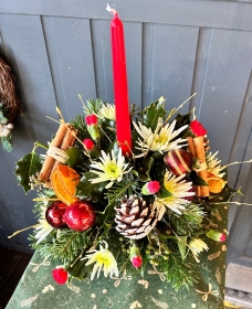 Christmas Round Table Arrangement With Candle